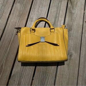 Never used Betsey Johnson yellow bow purse.